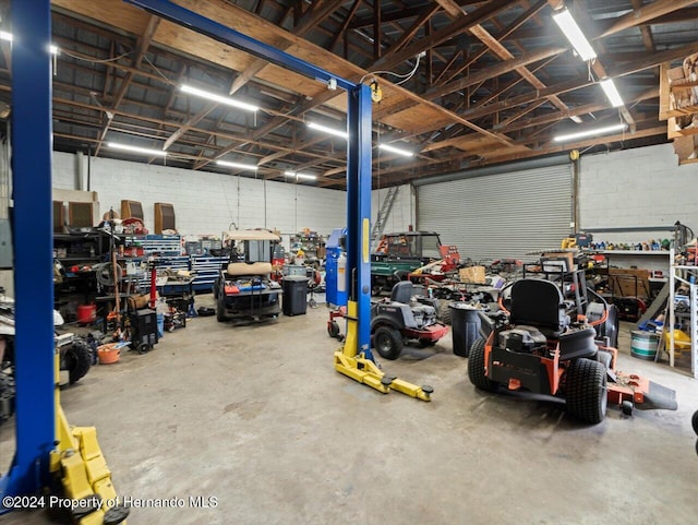 garage with a workshop area