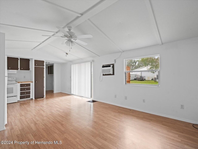 unfurnished living room with a wall mounted air conditioner, vaulted ceiling with beams, light hardwood / wood-style flooring, and ceiling fan