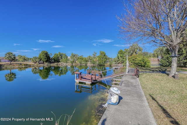 view of dock with a water view