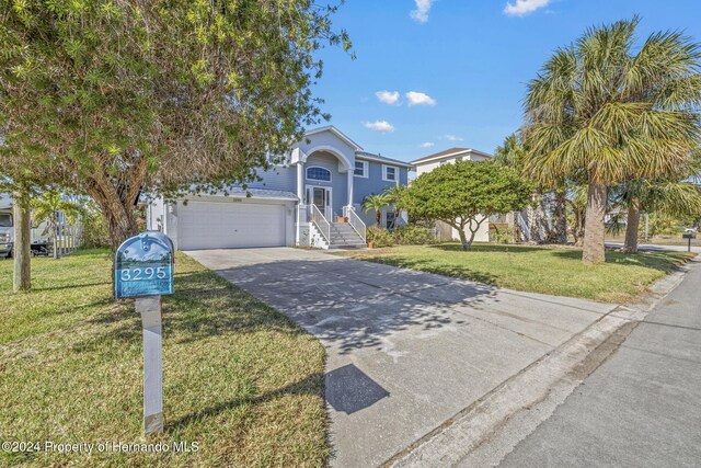 view of front of home with a front yard