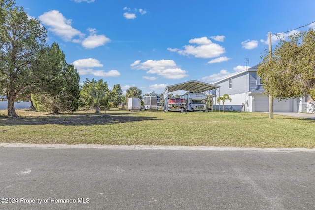 view of yard featuring a carport