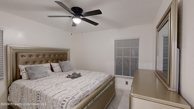 bedroom featuring ceiling fan