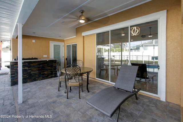 view of patio / terrace with ceiling fan