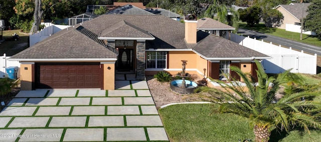 view of front of house with a garage