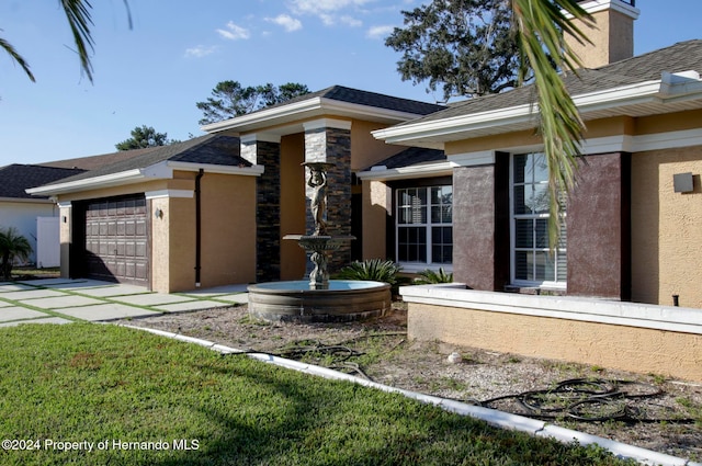 view of front of house with a garage