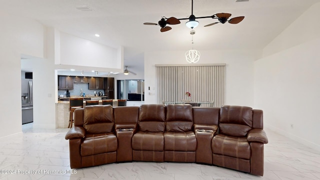 living room featuring high vaulted ceiling