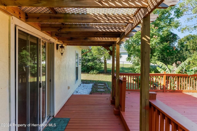 wooden deck with a pergola