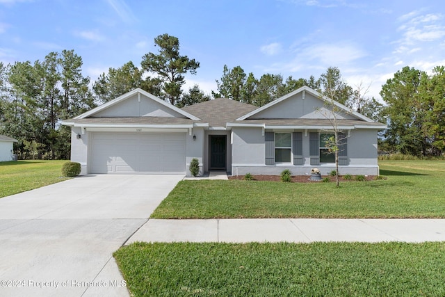 ranch-style home with a garage and a front lawn