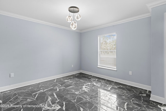 spare room featuring crown molding