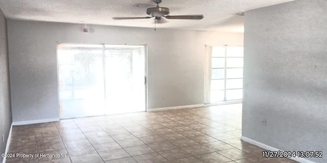 empty room featuring ceiling fan