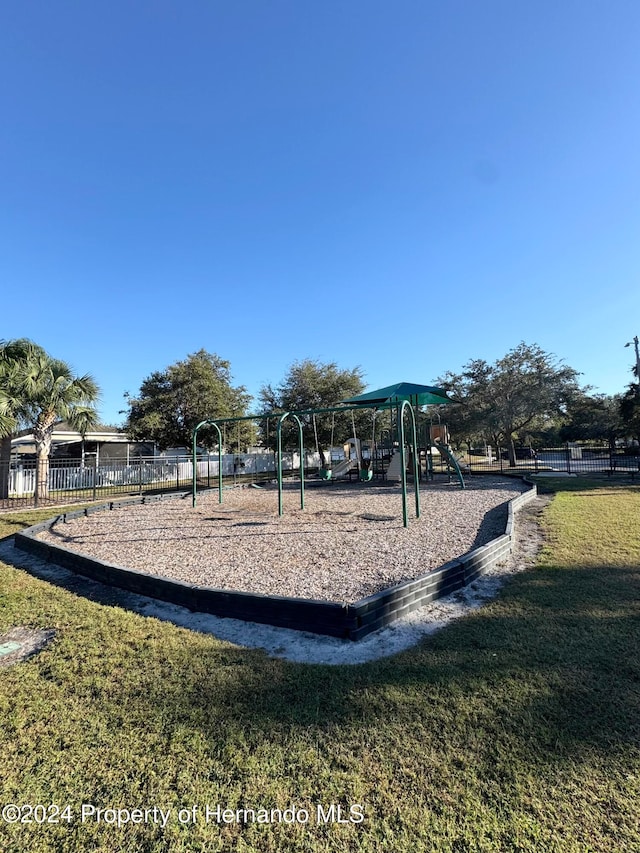 view of play area with a yard