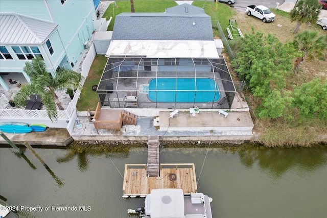 birds eye view of property featuring a water view