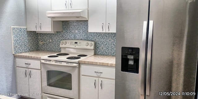 kitchen with backsplash, ventilation hood, electric range, white cabinets, and stainless steel fridge with ice dispenser