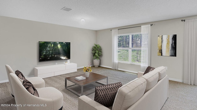 living room with light carpet and a textured ceiling