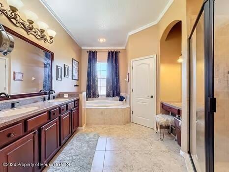 bathroom featuring tile patterned flooring, vanity, ornamental molding, and plus walk in shower