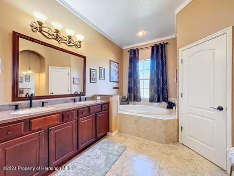 bathroom with vanity, tile patterned flooring, a relaxing tiled tub, and ornamental molding