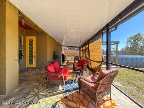 sunroom with a healthy amount of sunlight