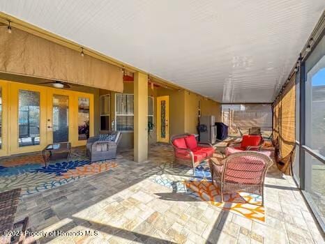 sunroom / solarium with french doors