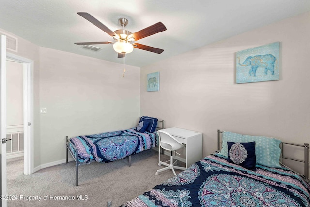 bedroom with ceiling fan and light colored carpet