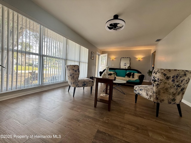 sitting room with hardwood / wood-style floors