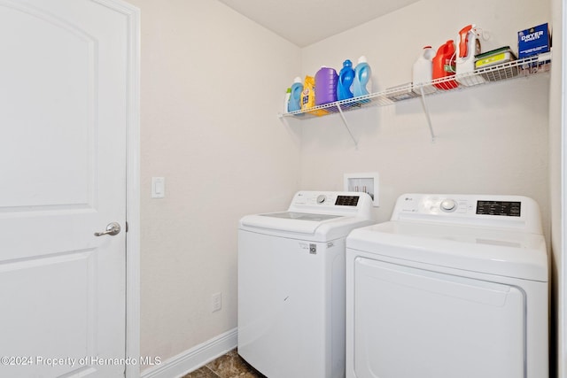 washroom with independent washer and dryer