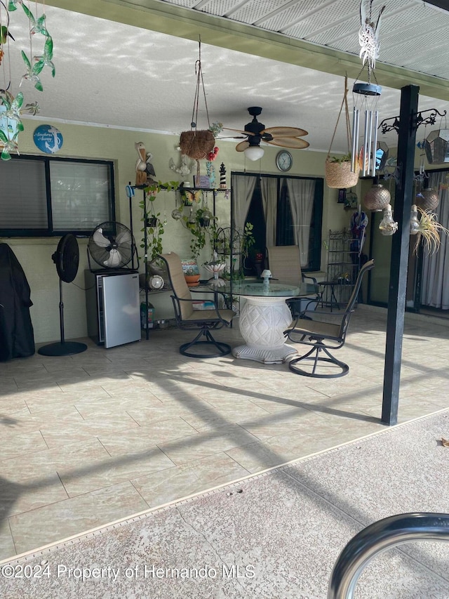 view of patio with ceiling fan