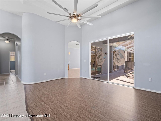 spare room featuring ceiling fan and light hardwood / wood-style flooring