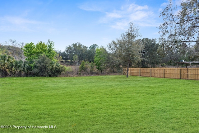 view of yard with fence