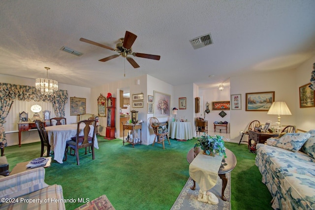 living room with carpet, ceiling fan with notable chandelier, and a textured ceiling