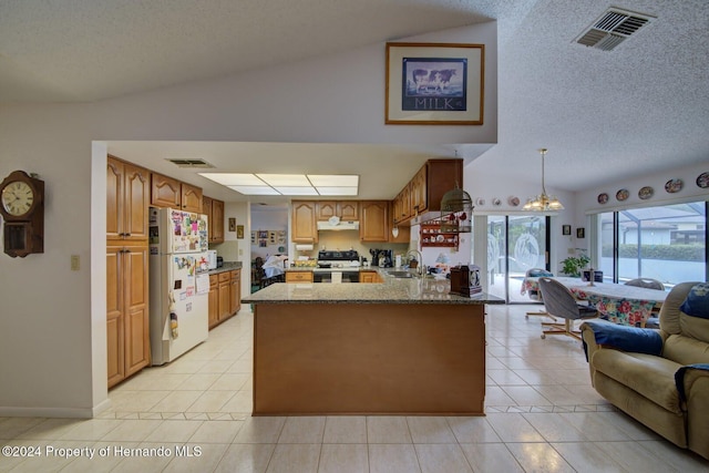 kitchen featuring light tile patterned floors, white refrigerator, black electric range oven, hanging light fixtures, and lofted ceiling