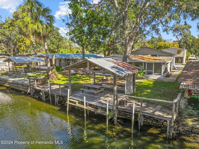 dock area featuring a water view