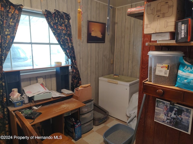 laundry room featuring wood walls