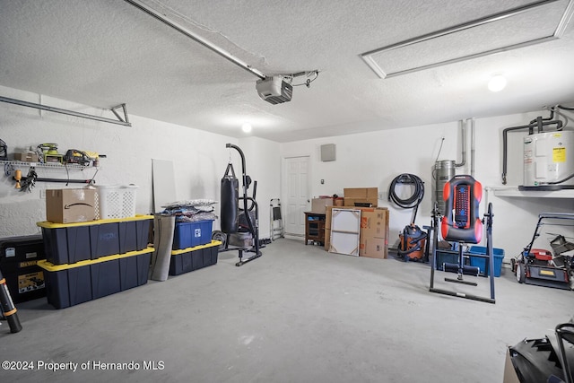 garage featuring electric water heater and a garage door opener