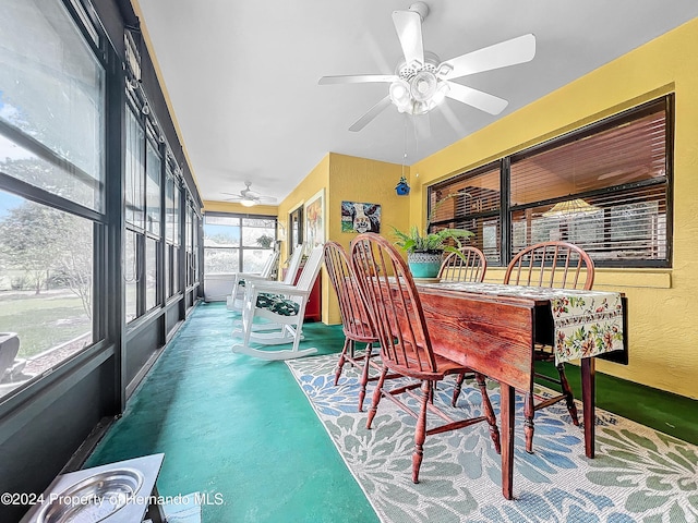 sunroom / solarium with ceiling fan