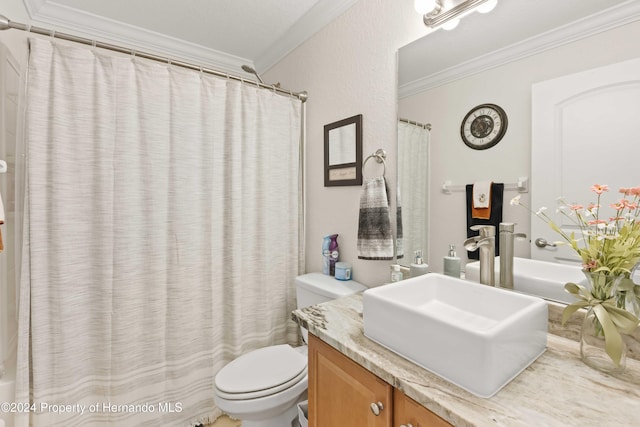 bathroom with a shower with shower curtain, vanity, toilet, and ornamental molding