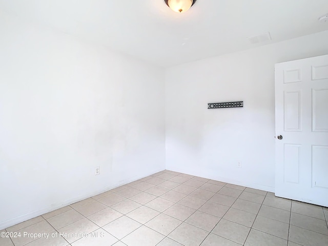 view of tiled spare room