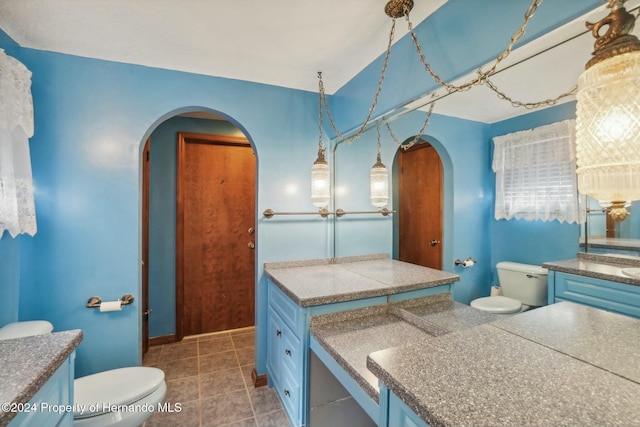 bathroom with tile patterned flooring and toilet