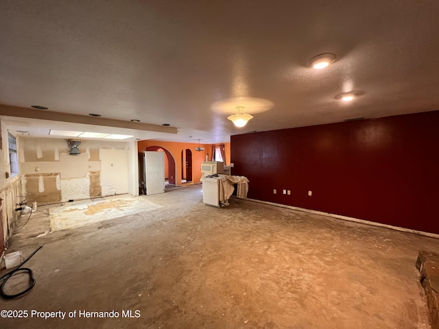 interior space featuring concrete flooring