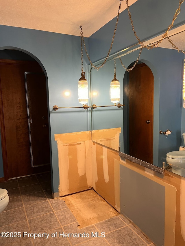 bathroom featuring toilet