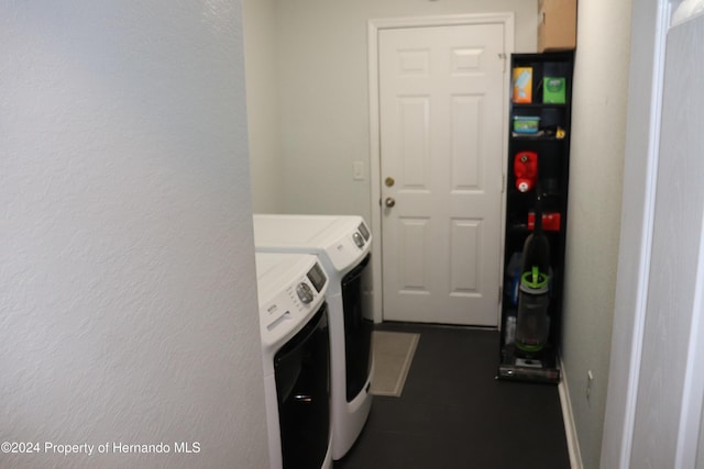 clothes washing area with independent washer and dryer