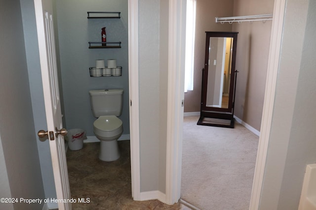 bathroom featuring toilet