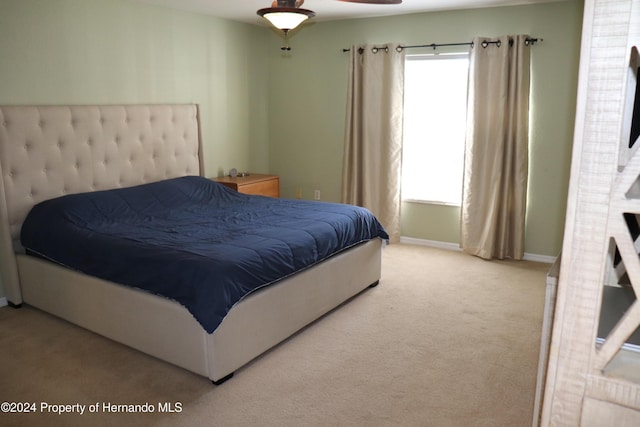 bedroom with carpet flooring and ceiling fan