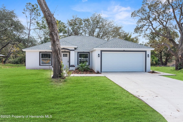 ranch-style house with driveway, a shingled roof, an attached garage, a front yard, and stucco siding