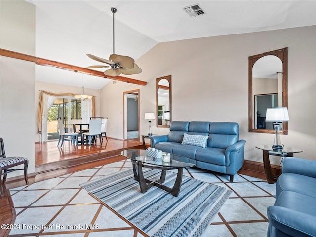 living room featuring wood-type flooring, ceiling fan, and lofted ceiling