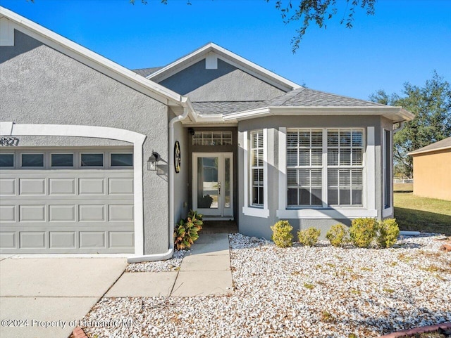 ranch-style house featuring a garage