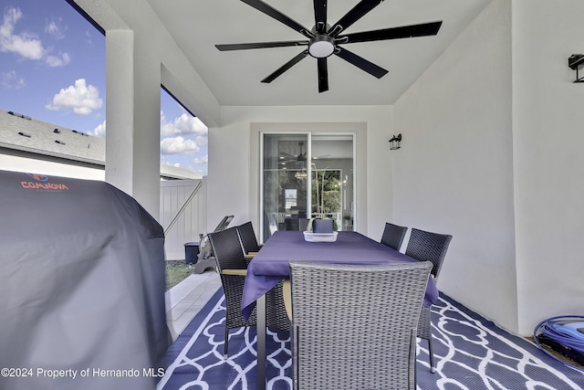 view of patio / terrace featuring ceiling fan