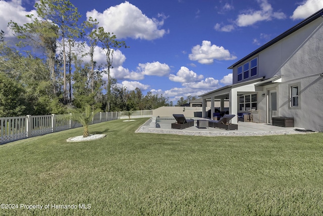 view of yard featuring outdoor lounge area and a patio