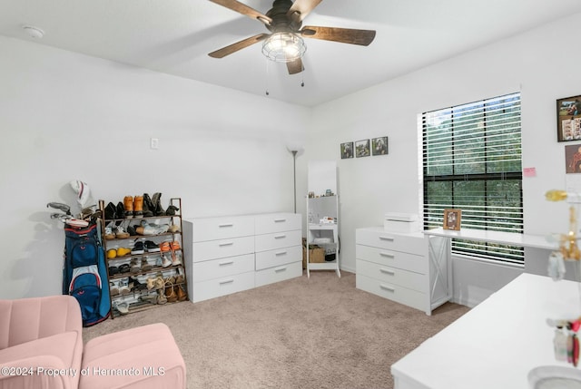 carpeted bedroom featuring ceiling fan