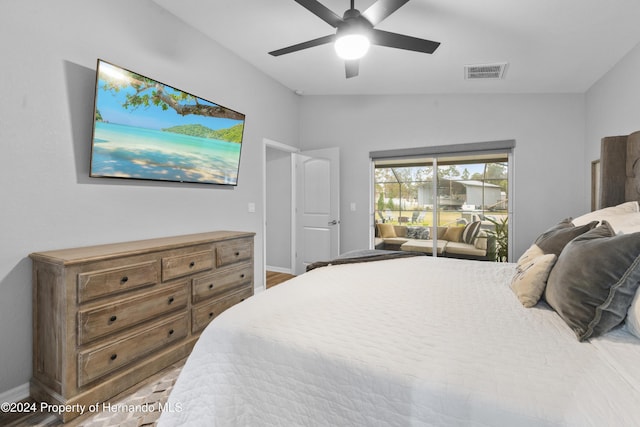 bedroom with vaulted ceiling and ceiling fan