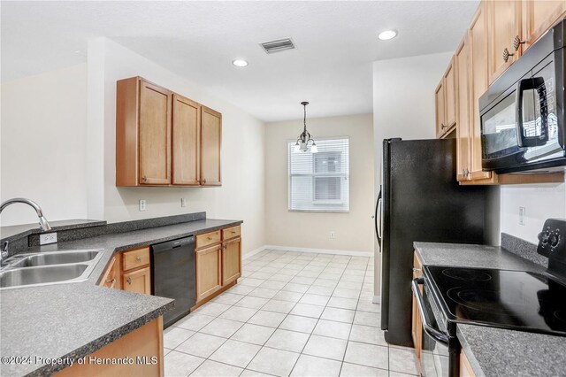 kitchen with sink, black appliances, a chandelier, hanging light fixtures, and light tile patterned flooring